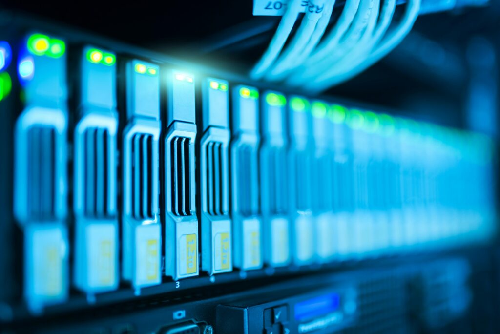 Detailed image of a server rack with glowing lights in a modern data center.